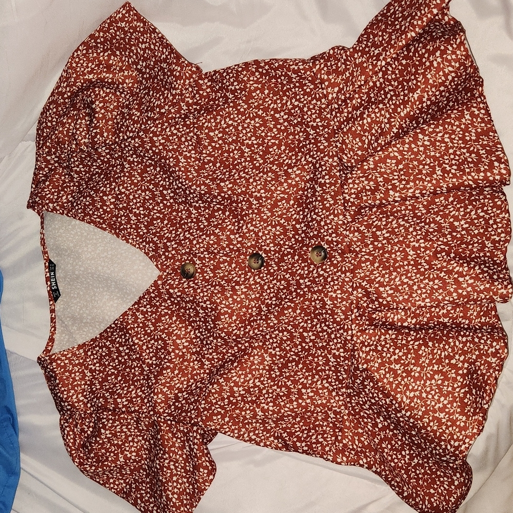 Blouse with flare bottom part from  Shein xs fits more like a small or medium.